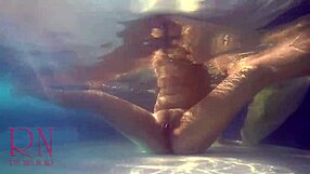 Fingers herself mermaid in beautiful bikini on the beach