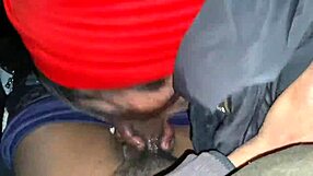 Young girl performing a cry facial on a large black penis