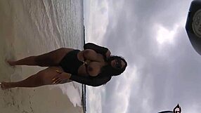 Snapping Ebony beauty at the nude beachside shoot for FirehouseXXX