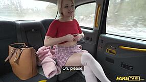 Blonde uses her endowments during what appears to be a fake taxi ride