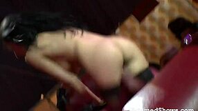 A mischievous brown haired girl does a striptease in front of the crowd and released the allure