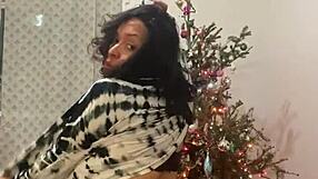 A seductive Caribbean dance by Anna Maria in a Christmas themed video