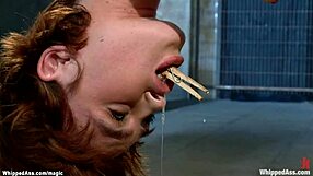 Lesbian sex – kinky lesbian dominates with ass paddle and gags