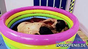 bikini clad Romana Ryder and Tammie Lee getting steamy by the pool
