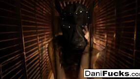 Big tits and ass tease Dani Daniels from inside a cage
