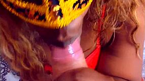 Black beauty gives sloppy blowjob with a dildo