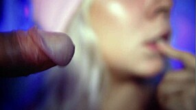 In this video, a man's penis is pleasure by this stunning woman up close