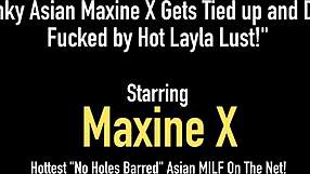Asian loving traveler and adventurer Maxine X is restrained and driven by a dominant seductress Layla Lust and peneetrated with a toy