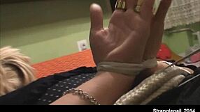 Girl bound tight and hogtied with palms exposed