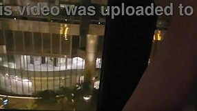 Ejaculation in an open place by a hotel window
