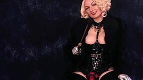 Have a rubber BDSM scene with a European domme