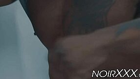 Gay sex: a well built, bearded white man is overpowered by strong black man's buttocks
