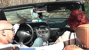 A red head in lingerie takes it from a stranger on the road