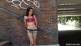 A tiny breasted woman is chained and then fu c ked in a perverted public orgy demo
