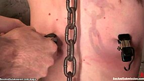 Tiny submissive, suspended and anal pierced