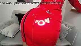 In German porn, Nina plays devil with fiery red fetish attire stealing the show