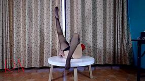 Amateur babe with big labels and hidden pantyhose and heels unwrapping at the table