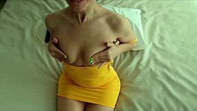 Blonde beauty Lana in yellow dress fancies herself, openly masturbating and rubbing her narrow and juicy cunt enjoying the solitude at home