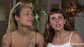 European girls kiss and touch in the bedroom