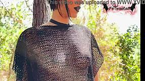 A gothic elf has sex in the woods.