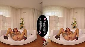 Red Fox is a tattooed MILF who wears high heels and masturbates in VR.