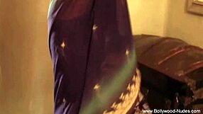 Bollywood brunette beauty teases in an erotic dance experience