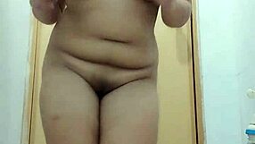 Asian beauty dancing alone in the night club