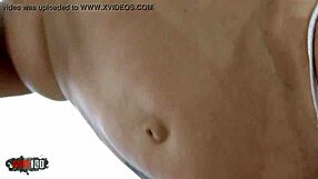 Lyna Cypher is a brunette MILF who performs a hot striptease at the pool.