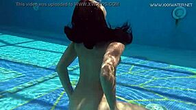 Teen skinny brunette Jessica Lincoln shows off her body in the pool