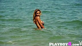 Cara Mell's beach striptease exposes her small, perfect tits