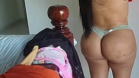 Beautiful woman showing off her big boobs and butt in a video