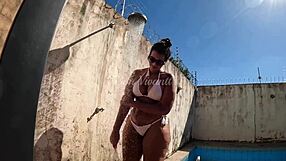 Big tits bouncing while taking a hot outdoor shower