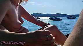 Greek nudist beach encounter with French MILF for a handjob