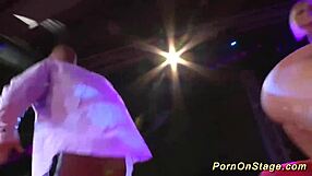 Clothes ripped during a threesome on a stage in a public scandal