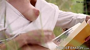 Beautiful woman pleasuring herself after reading a book