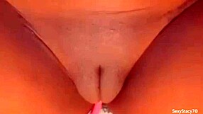 Stacy's solo masturbation session with a big unshaven clit