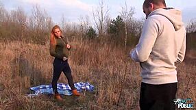 A red-haired beauty has a passionate affair with a strange man outside