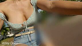 Married woman exposes her breasts while riding a bike in a public road