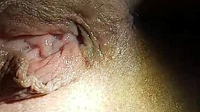 A dominatrix with a shaven and petite body enjoys hardcore pleasure