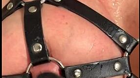 Big tits bouncing while being choked and gagged in this German fetish video