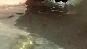 Amateur MILF shows off her curves on the beach while she urinates