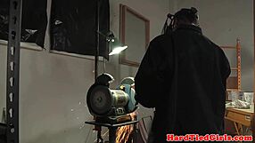 A BDSM scene with a submissive woman being tied up and flogged by an interracial dominant couple