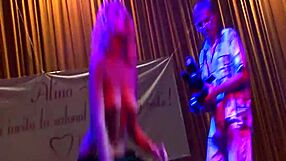 Skinny blonde gives a sexy lap dance on the public stage