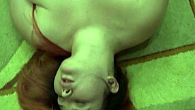 Redhead MILF enjoys anal masturbation and big booty shaking