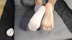 Skinny gay boy's feet and big cock in action