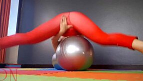 Yoga instructor in red leotard teaches poses in hospital