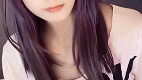 Asian beauty gets her pussy licked by her own fingers