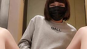 A transsexual gets off while pleasuring herself in a hotel room