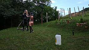 Petite BDSM Mistress trains her shemale slave outdoors