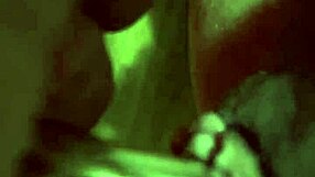Close up of a woman pleasuring herself with a vibrator on her clit